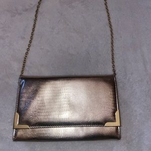 Style & Co off the the shoulder gold clutch purse.
